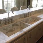 These Calacatta Gold sink was fabricated to match the 5cm Calacatta Gold raised bar and sink counter