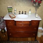 This is a White Carrara vanity top in a customized cabinet
